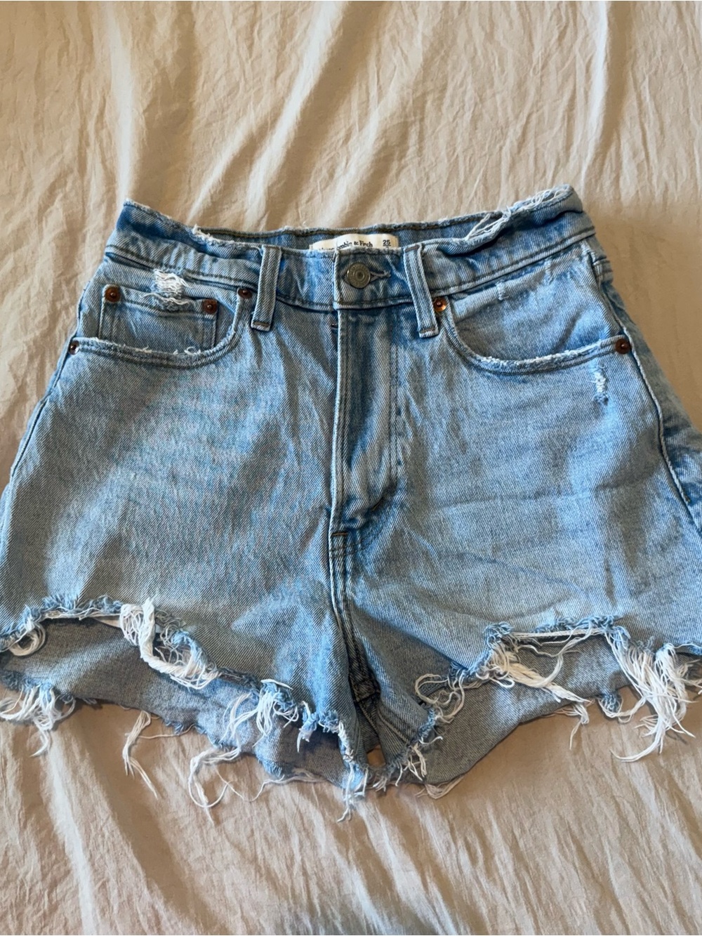 High-Rise Light Blue Distressed Denim Shorts